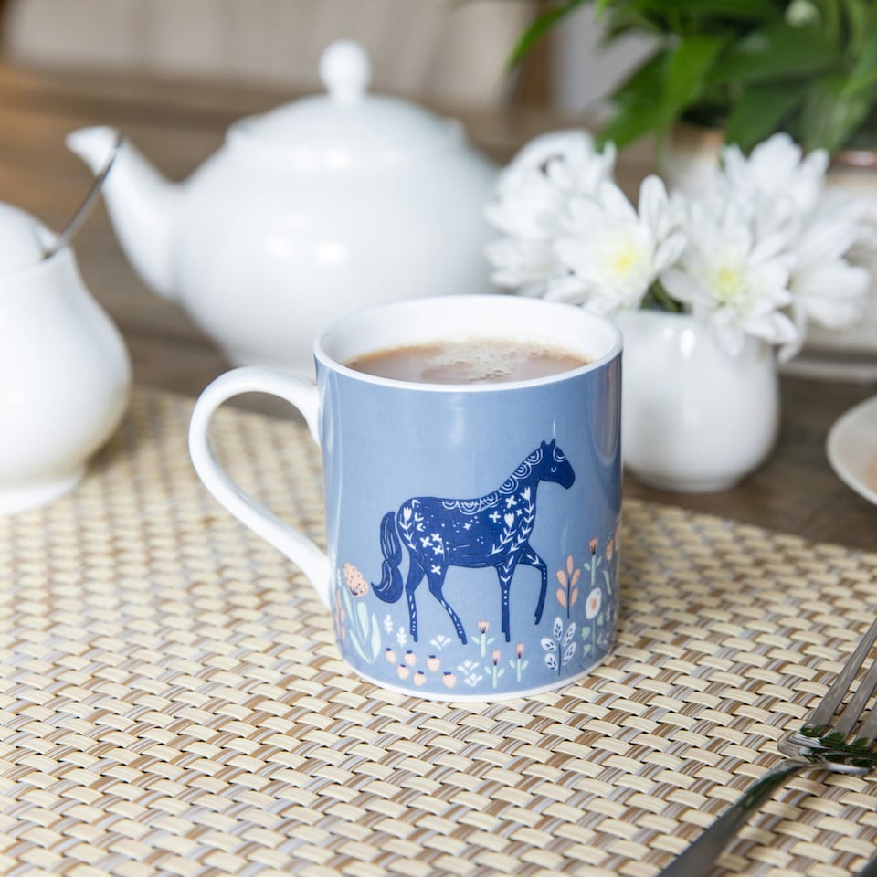 image 1 of KitchenCraft Fine Bone China Woodcut Horse 250ml Can Mug | Blue