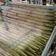 image 4 of True Products Pressure Treated Round Wooden Fence Posts 1200mm x 50mm - Pack of 20 | Brown | Brown | 20