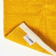 image 5 of Homescapes Mustard Cotton Plain Chenille Rug with Natural Trim - 110 x 170 cm | Yellow | Mustard