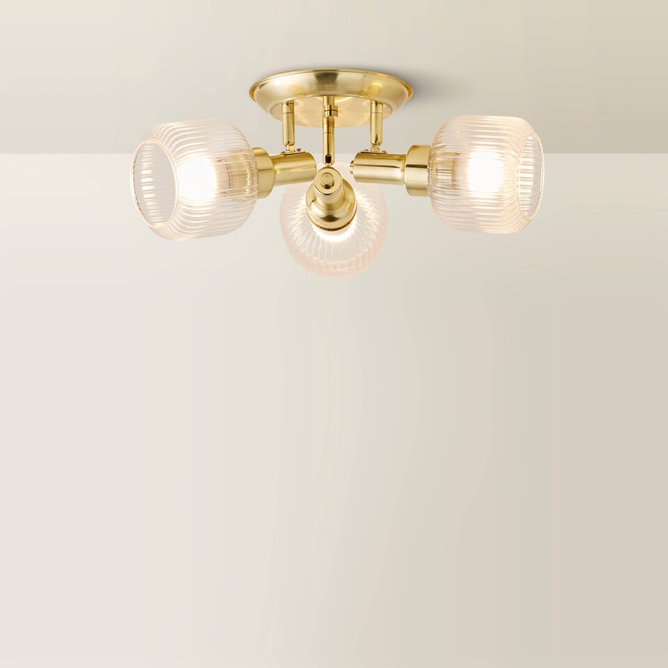 image 1 of ValueLights Calpe 3 Way Brass Ceiling Spotlight Ribbed Clear Shades | Bronze