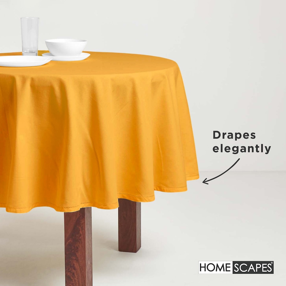 image 1 of Homescapes Mustard Yellow Cotton Round Tablecloth - 178 cm | Yellow | 178cm (70")