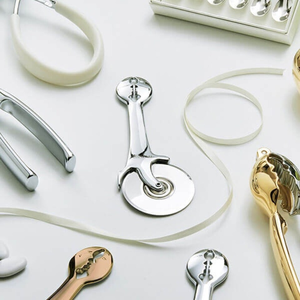image 1 of Bugatti Kiss Pizza Cutter Chrome
