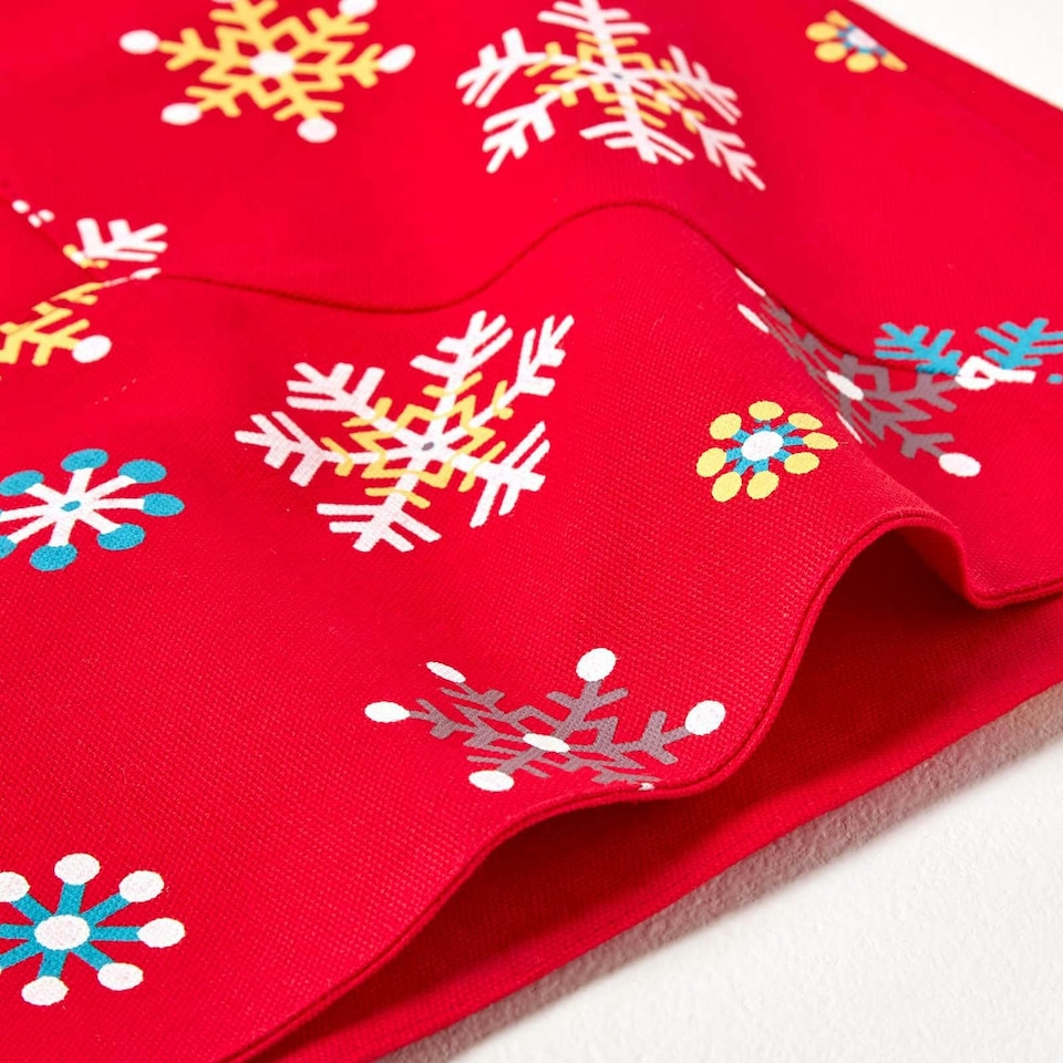 image 1 of Homescapes Cotton Christmas Red Snowflake Border Tablecloth - 137 x 228 cm | Red | 137cm x 228cm (54" x 90")
