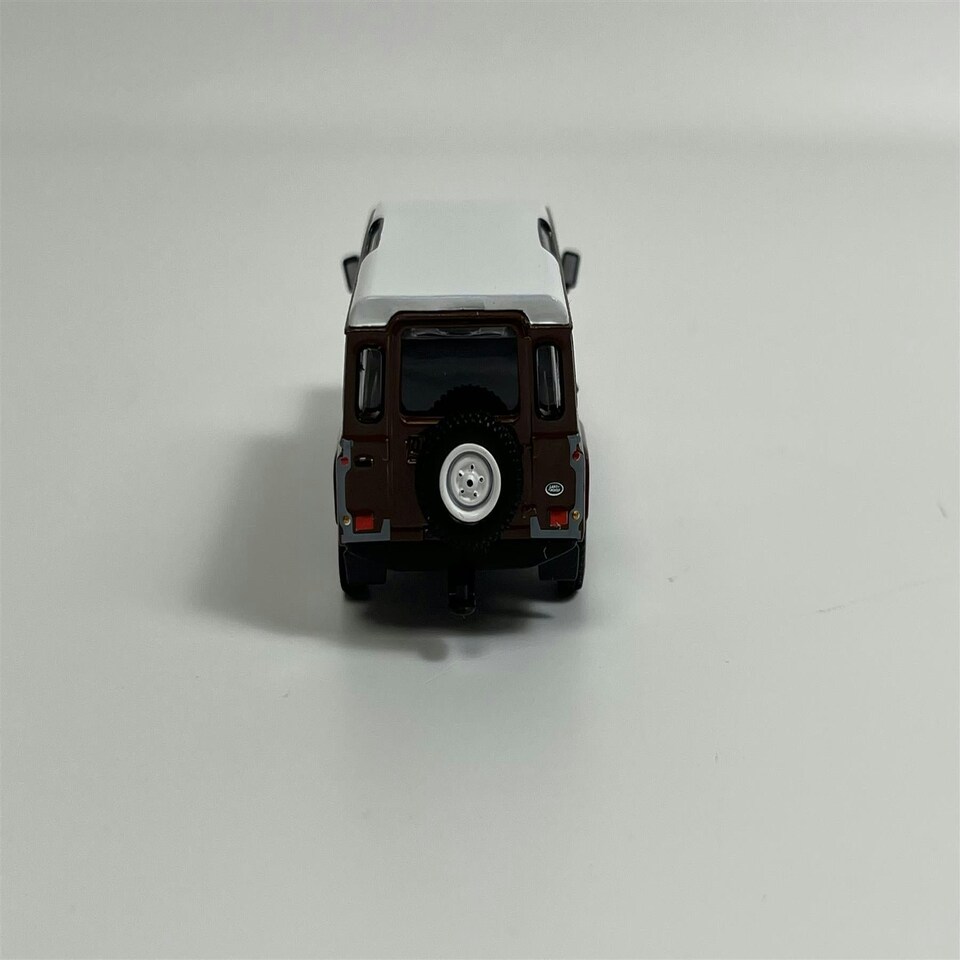 image 1 of Land Rover Defender 110 1985 County Station Wagon Russet Brown LHD 1:64 Mini GT MGT00734L