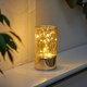image 8 of Auraglow Wire Rice Light - Glass Cylinder LED Battery Lantern | Gold