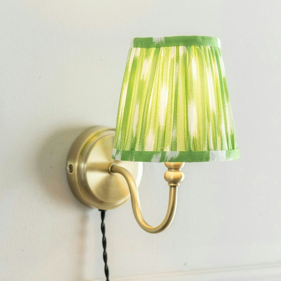 image 1 of ValueLights Neely Plug in Antique Brass Easy Fit Wall Light with Green Pleated Fabric Tapered Lampshade - Bulb Included