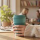 image 4 of Ecoffee Cup 12oz 350ml Reusable, Plant Based Coffee Cup with Silicone Lid & Sleeve - Bay of Fires
