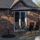 image 3 of Outdoor 4 Person Rectangular Glass Top Garden Dining Table Chairs With Black Banana Parasol and Base