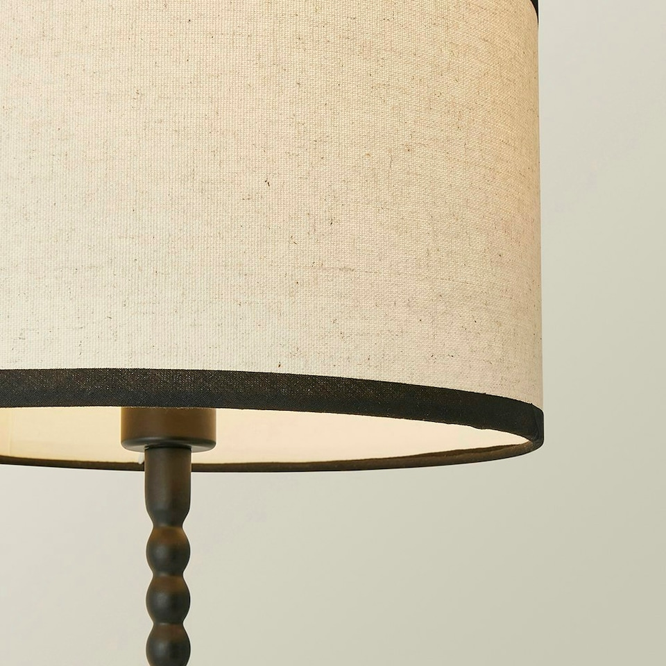 image 1 of ValueLights Maeve Natural Linen Black Trim Drum Shade Matte Black Bobbin Table Lamp and Bulb | Black