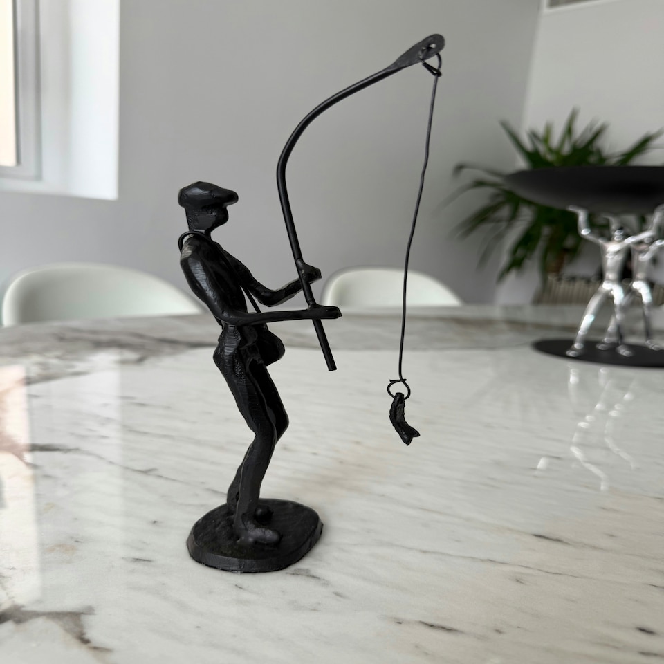 image 1 of Metal Sculpture off a Man with a Fishing Rod Reeling in his Catch Rustic Figurine Hobby Gift Sweet Memories Grandfather Father Son Vintage Decor Gift Present