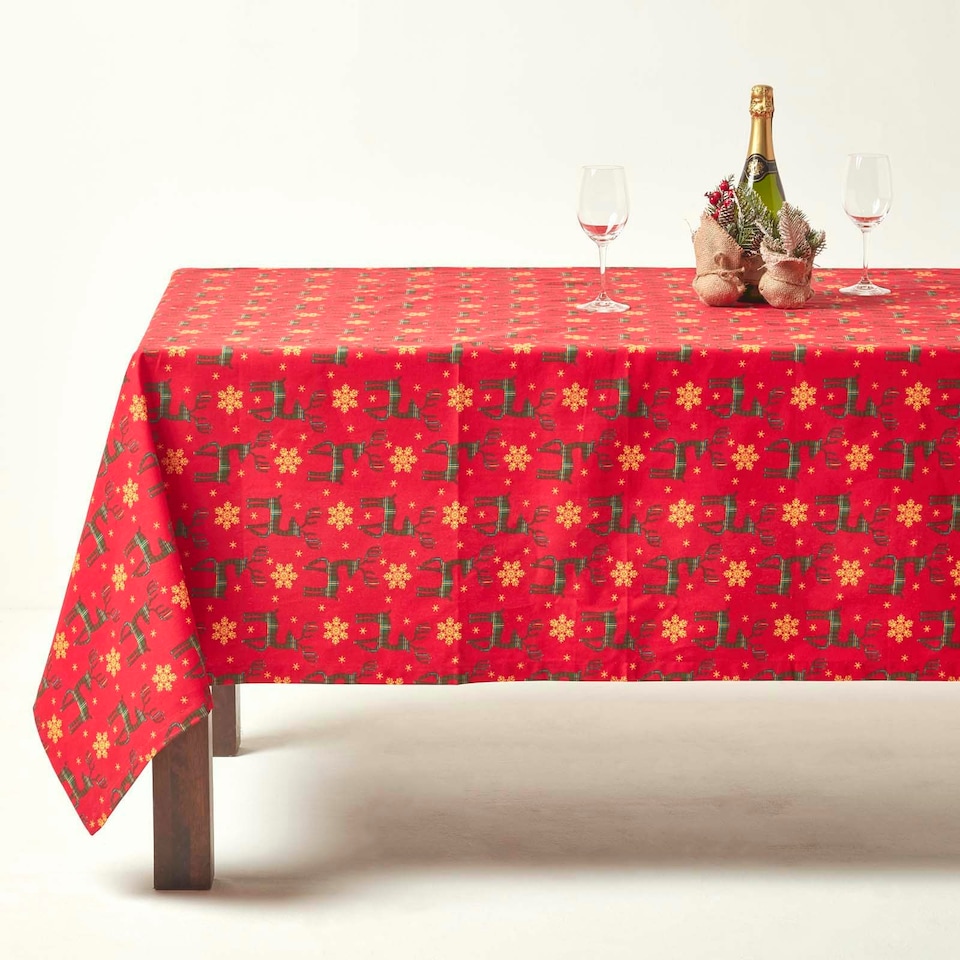 image 1 of Homescapes Red Reindeer 100% Cotton Christmas Tablecloth - 137 x 178 cm | Red | 137cm x 178cm (54" x 70")