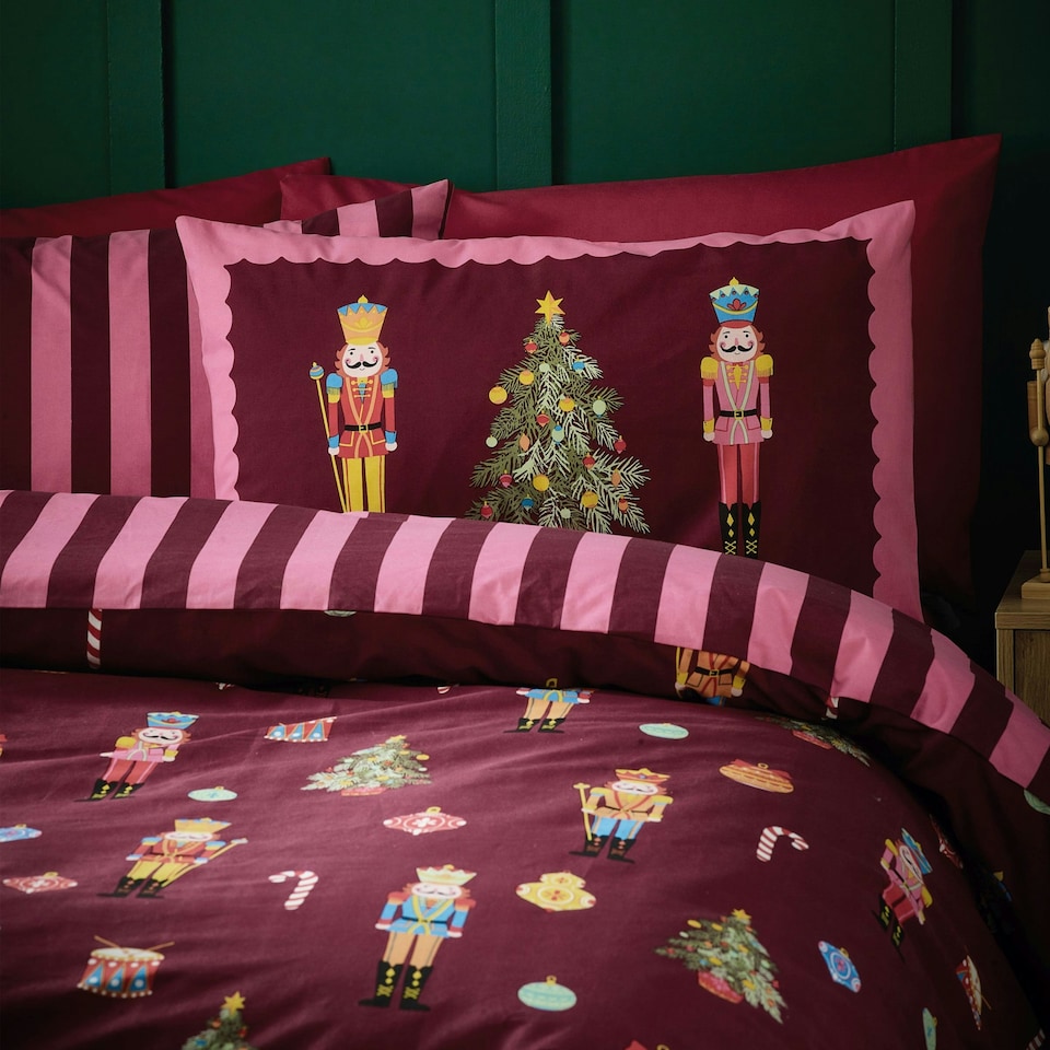 image 1 of Catherine Lansfield Christmas Nutcracker Stripe Reversible Duvet Cover Set Plum | Purple | Plum | Super King