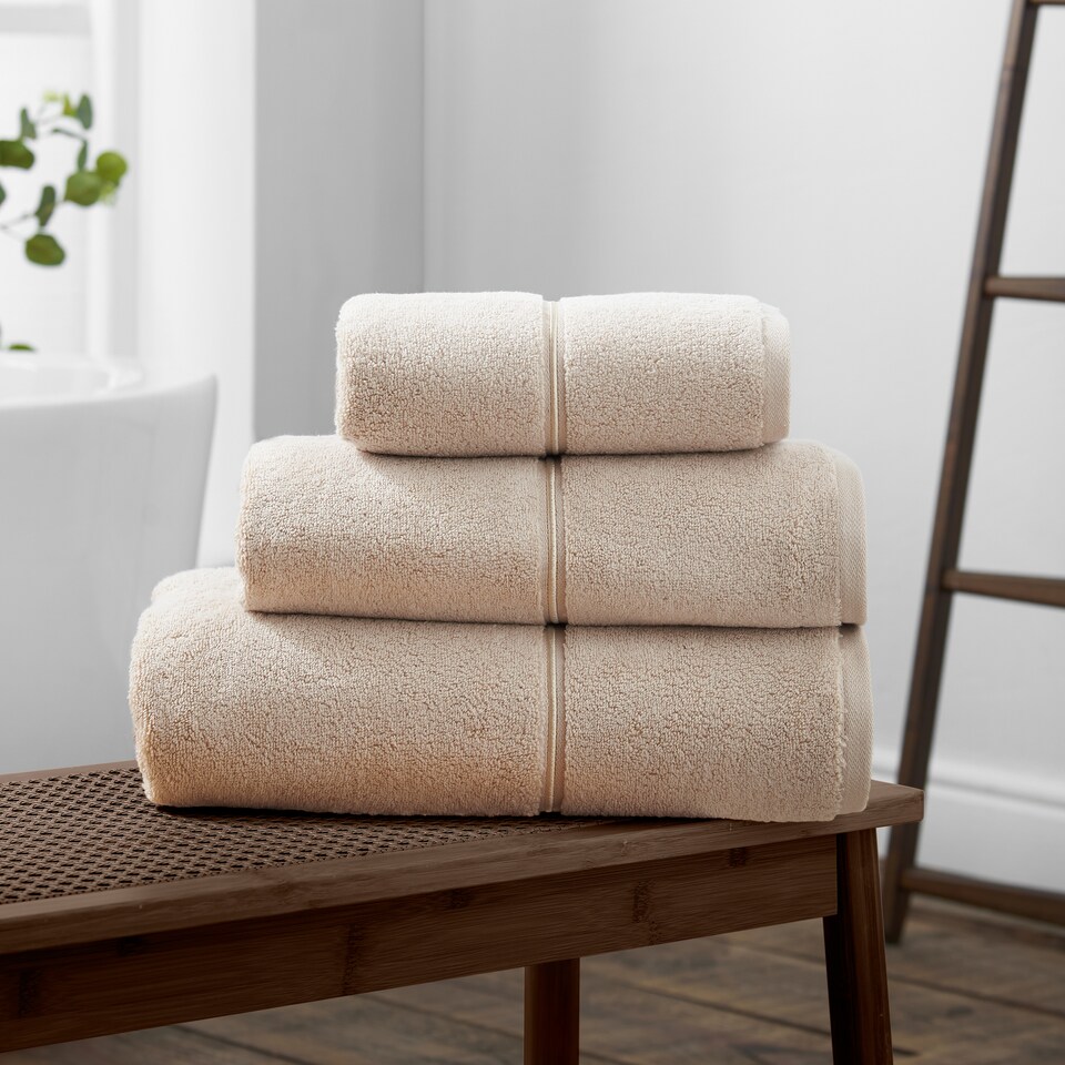 image 1 of Bianca Zero Twist Satin Stitch Cotton Bath Towel | Cream | Natural | Bath towel