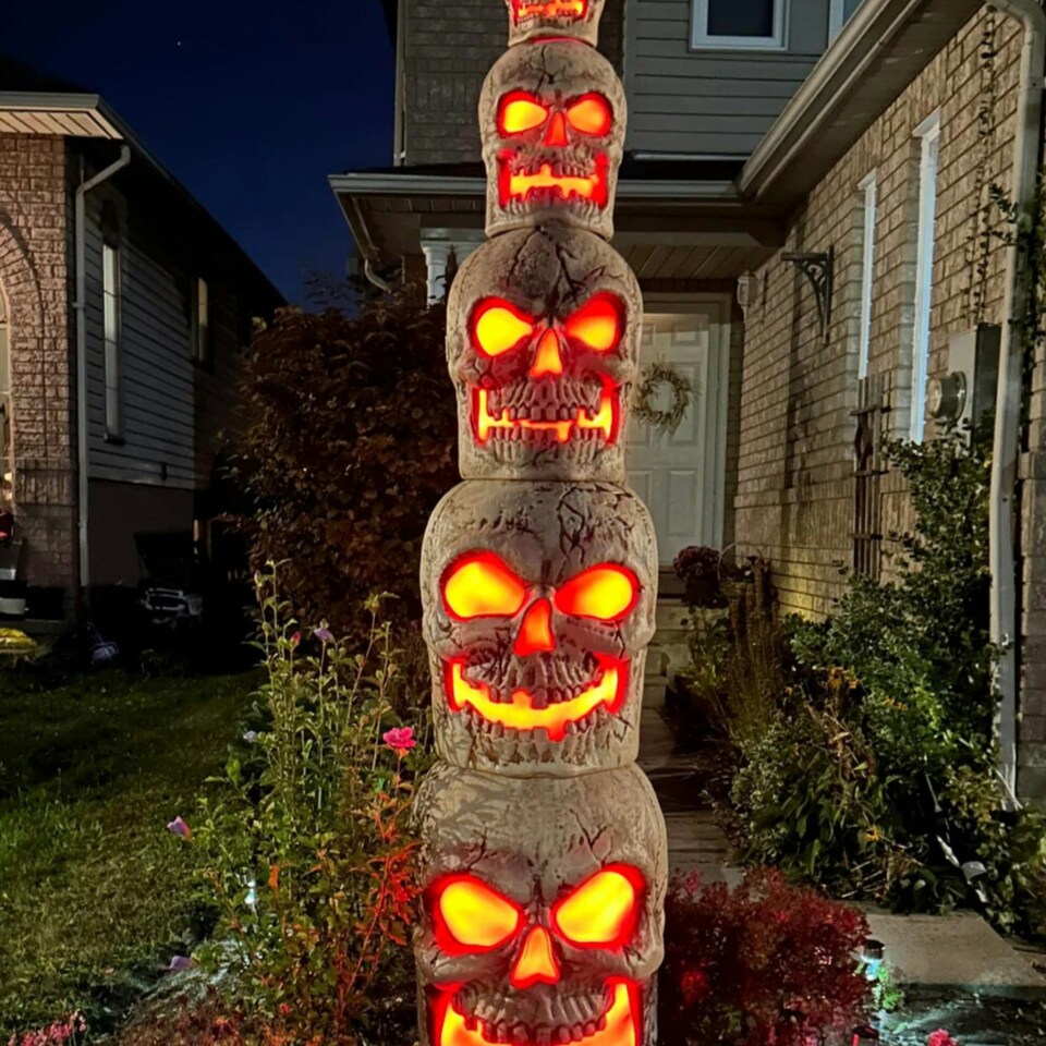image 1 of Home Accents Holiday 8ft Giant-Sized Halloween Skull Stack with Red LEDs
