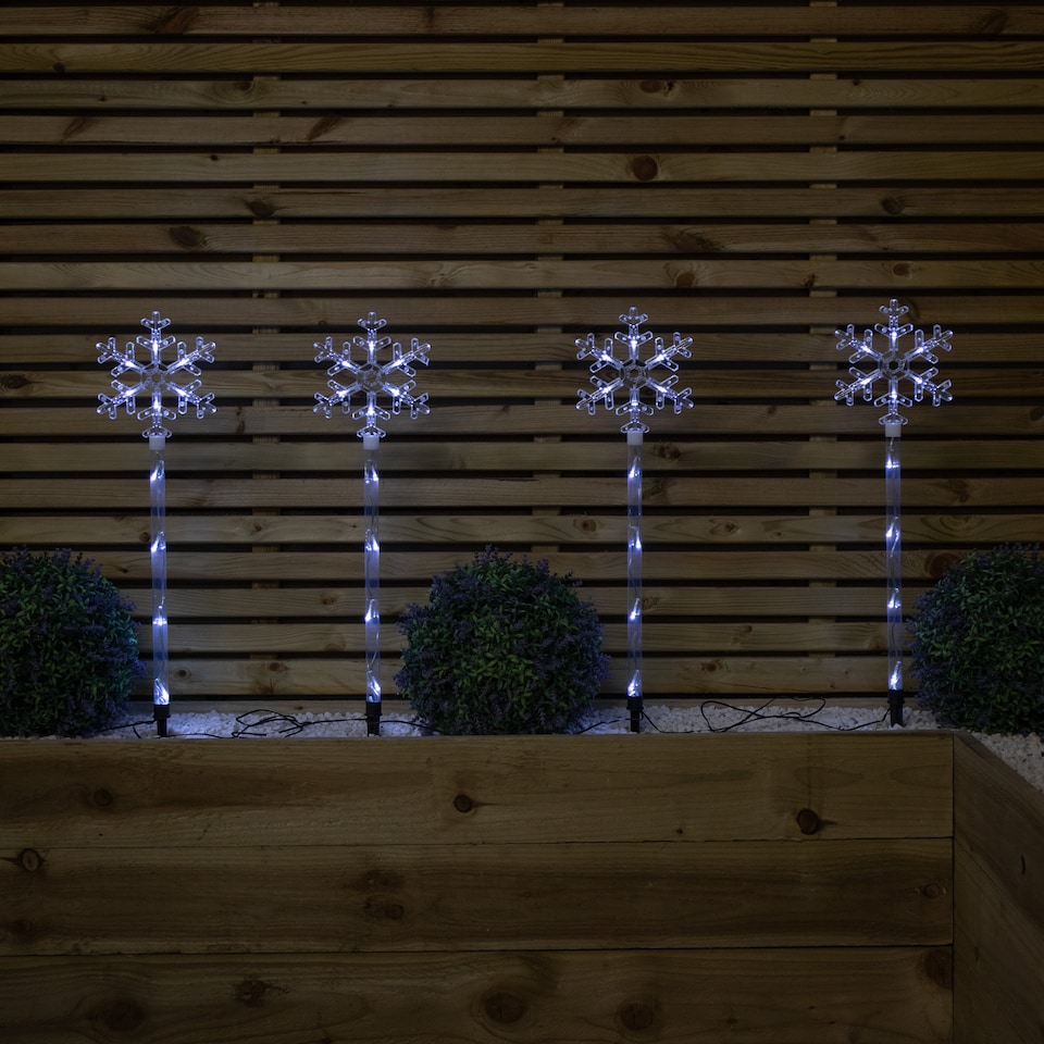 image 1 of 69cm Set of 4 Plastic Crystal Snowflake Pathfinder Christmas Lights with White LEDs