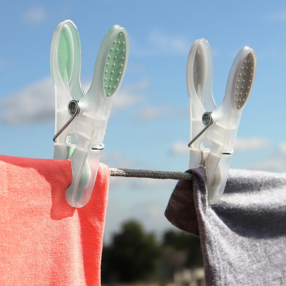 image 1 of JVL Peg Basket with 48 Soft Grip Plastic Clothes Pegs, Assorted Colours