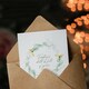 image 3 of Tuesday's Child is Full of Grace Floral Wreath New Baby Card