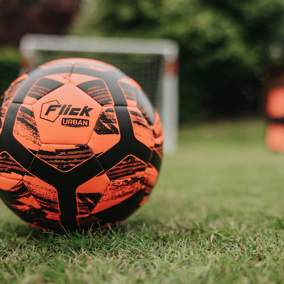 image 1 of Football Flick Size 4 Football – Training and Match Ball – Highly Durable with Shape Retention - Unique Orange and Black Design