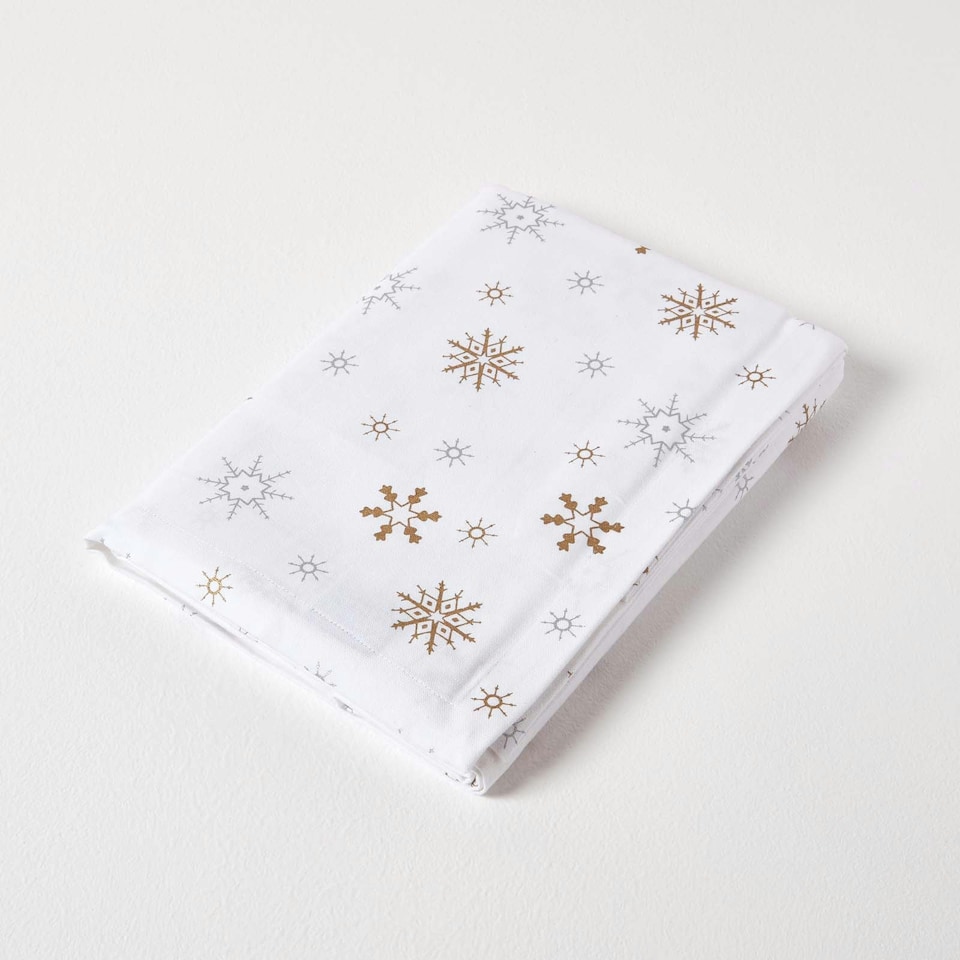 image 1 of Homescapes Gold Snowflake Christmas Tablecloth - 137 x 137 cm | White | 137cm x 137cm (54" x 54")