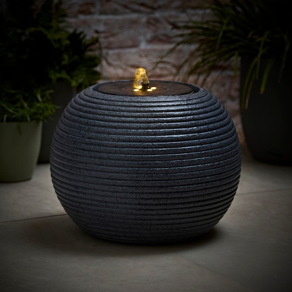 image 1 of ValueLights Round Ribbed Solar Power Outdoor Cascading Water Fountain | Grey
