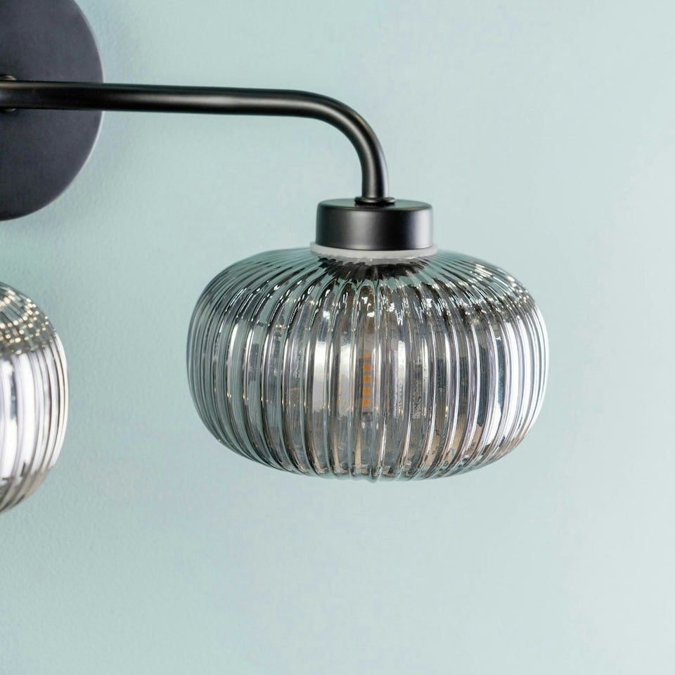 image 1 of ValueLights Amaia Matte Black IP44 Rated 2 Way Smoked Ribbed Glass Wall Light