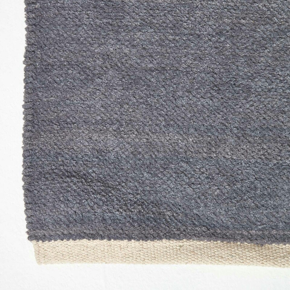 image 1 of Homescapes Dark Grey Cotton Plain Chenille Rug with Natural Trim - 110 x 170 cm | Grey | Dark Grey