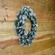 image 6 of 55cm Premier Christmas Snow Tipped Green Pine PVC Door Wreath