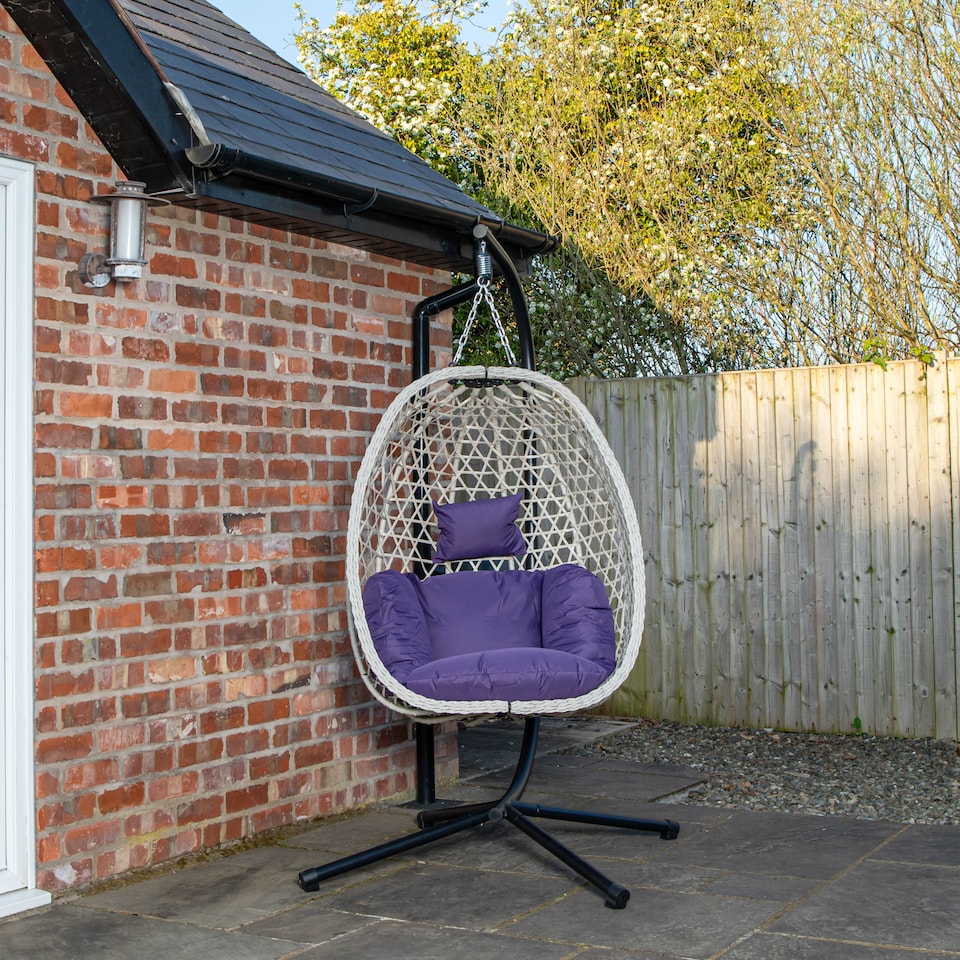 image 1 of Samuel Alexander Hanging Garden Rattan Egg Chair with Steel Frame and Waterproof Cover in Indigo | Purple | Indigo