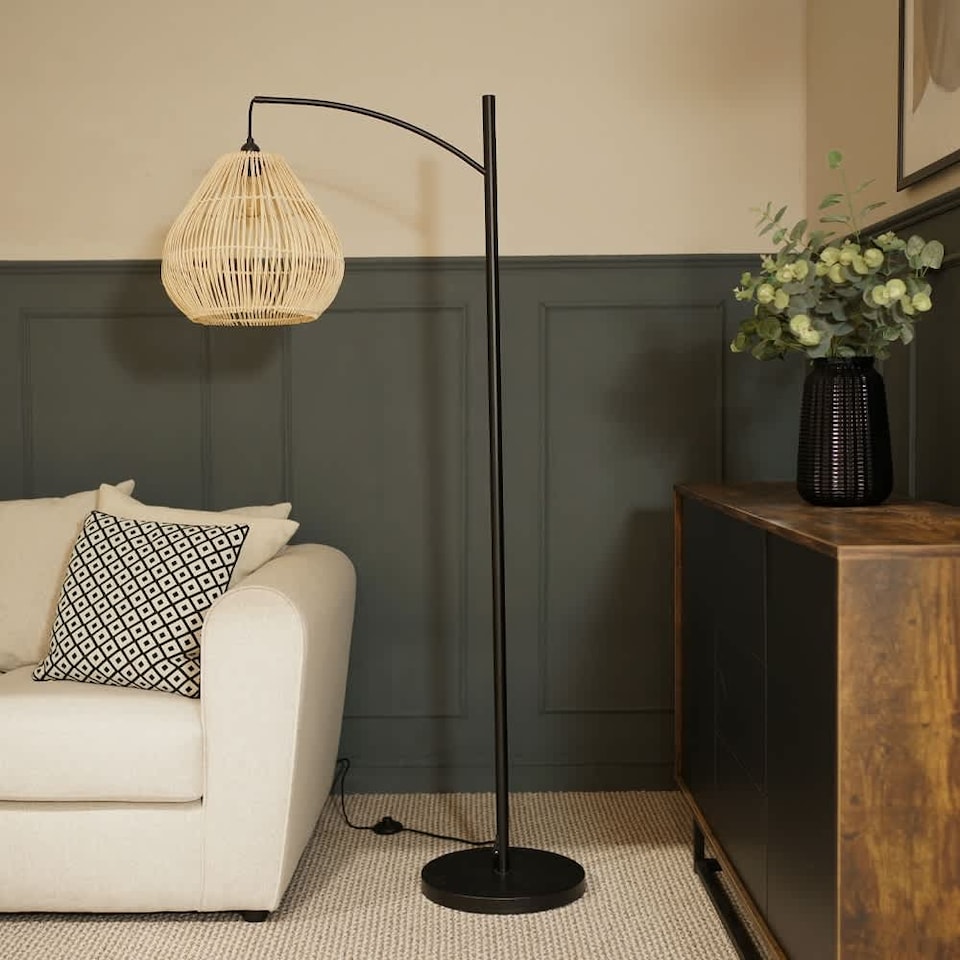image 1 of ValueLights Preto Black Metal Curve Stem Floor Lamp with a Natural Wicker Rattan Teardrop Shade | Cream