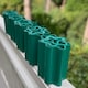 image 2 of Green Plastic Corrugated Garden Lawn Edging (9m x 15cm Roll) - 5 Rolls