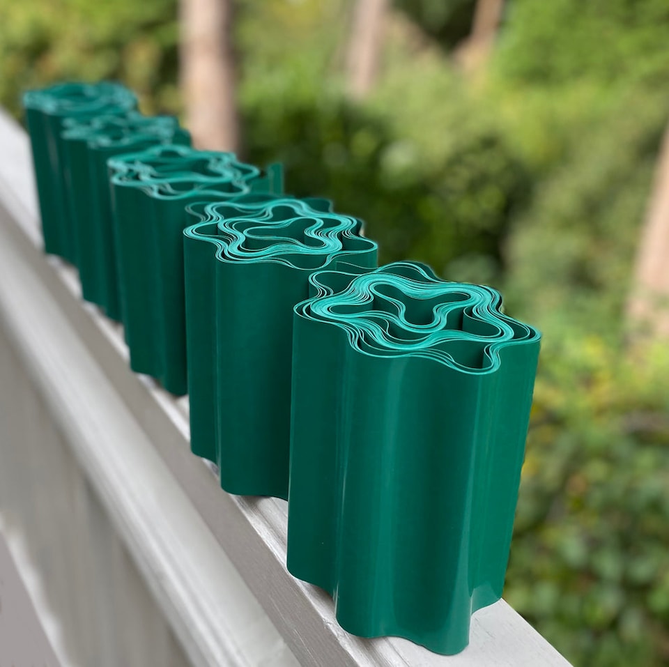 image 1 of Green Plastic Corrugated Garden Lawn Edging (9m x 15cm Roll) - 5 Rolls
