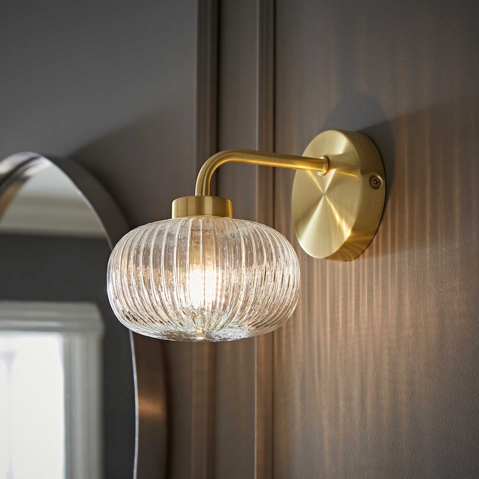 image 1 of ValueLights Amaia Gold IP44 Clear Ribbed Glass Wall Light & Bulbs | Gold
