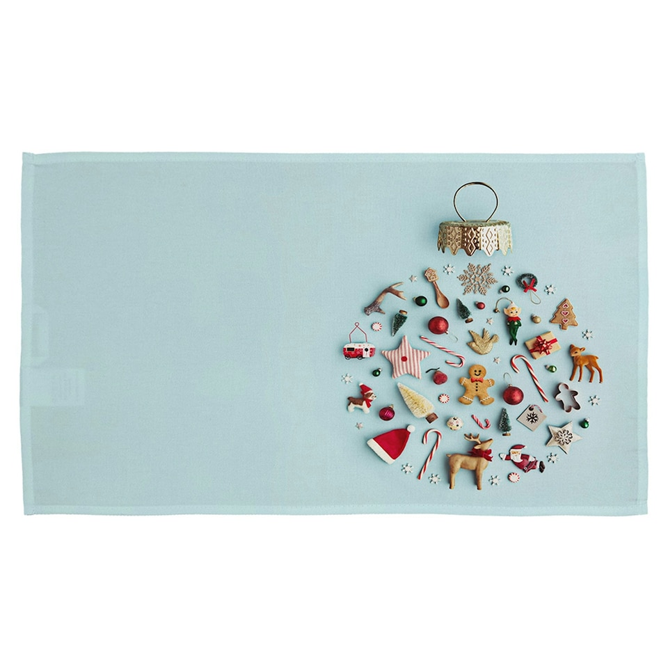 Christmas objects laid out (kitchen towel)