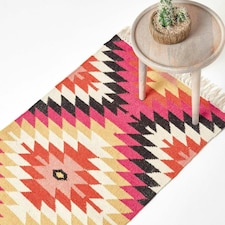 Homescapes Jakarta Handwoven Geometric KIlim Wool Hall Runner - 66 x 200 cm | Pink | Pink, orange, black, white and yellow