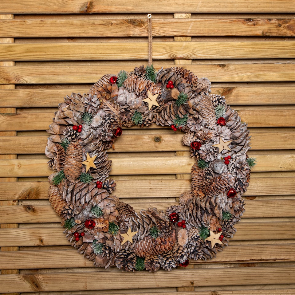 image 1 of 50cm Frosted Hanging Christmas Wreath with Red Jingle Bells & Wooden Stars