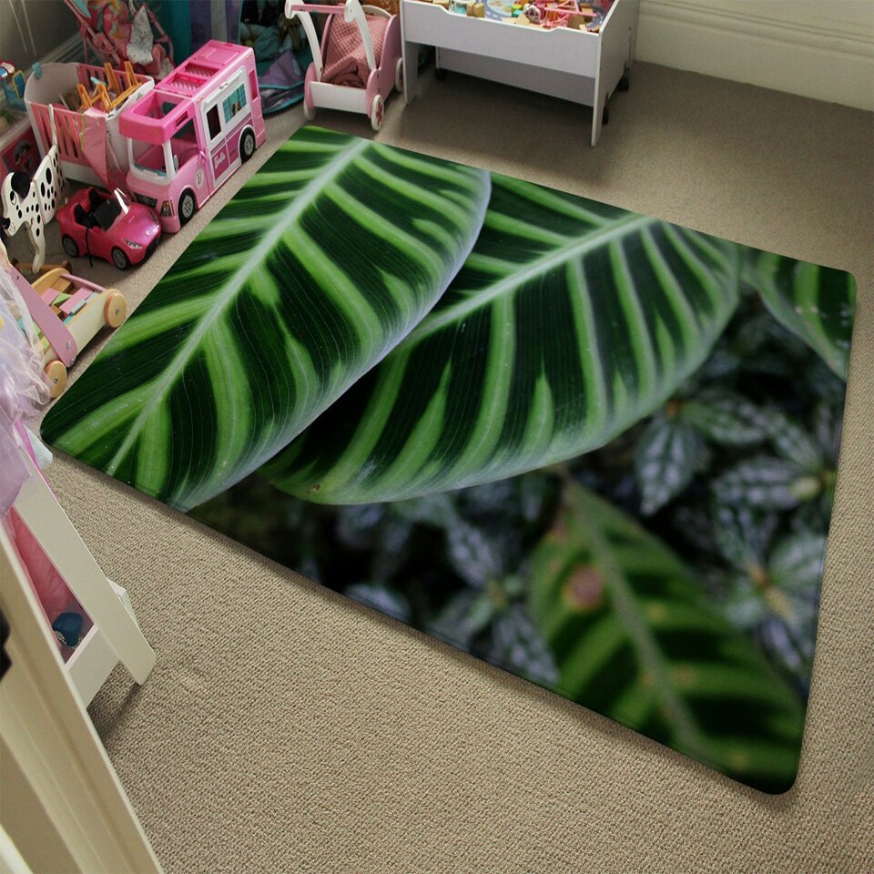 image 1 of Green leaves with white and yellow structure in exotic jungle setting (Rug) Green | L