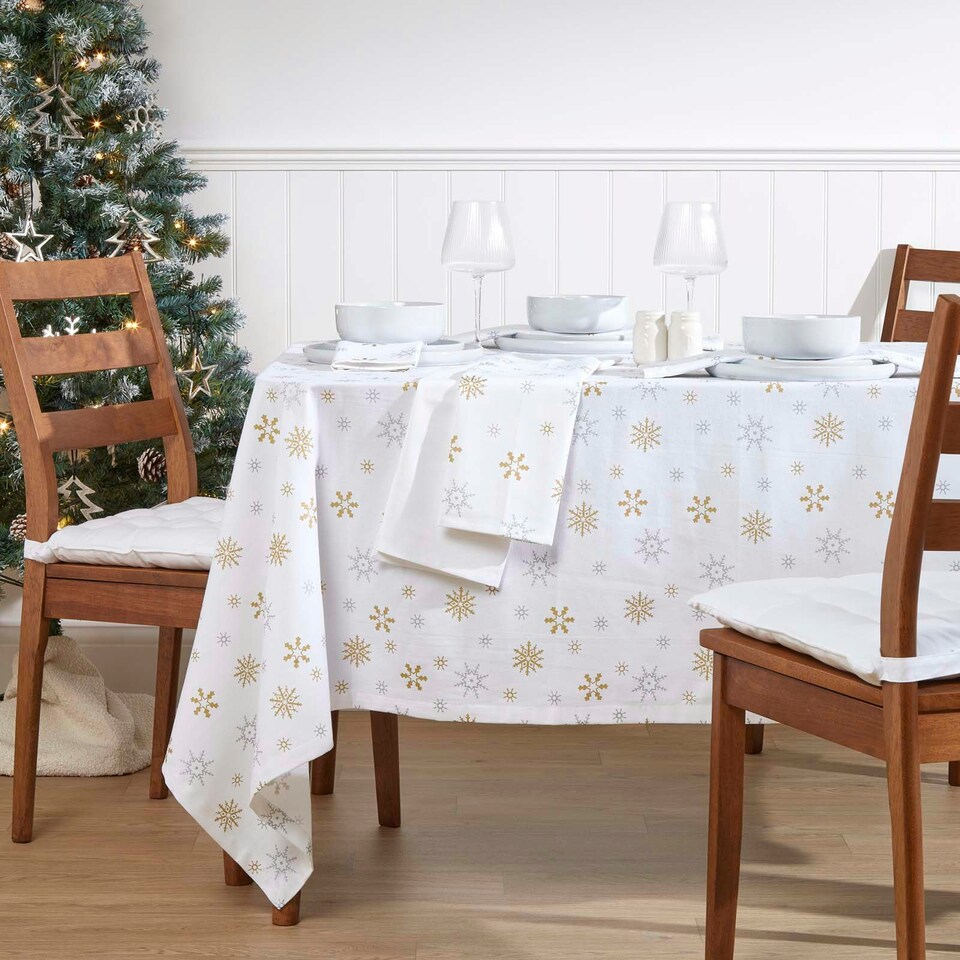 image 1 of Homescapes Gold Snowflake Christmas Tablecloth - 137 x 178 cm | White | 137cm x 178cm (54" x 70")