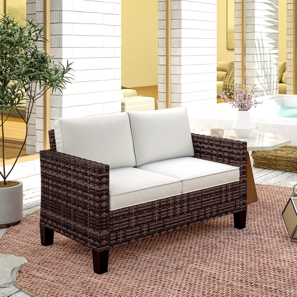 image 1 of Outsunny 2 Seater Rattan Sofa with Cushions, Wicker Garden Loveseat with Armrests, Outdoor Garden Sofa Couch with Steel Frame for Balcony, Porch, Brown