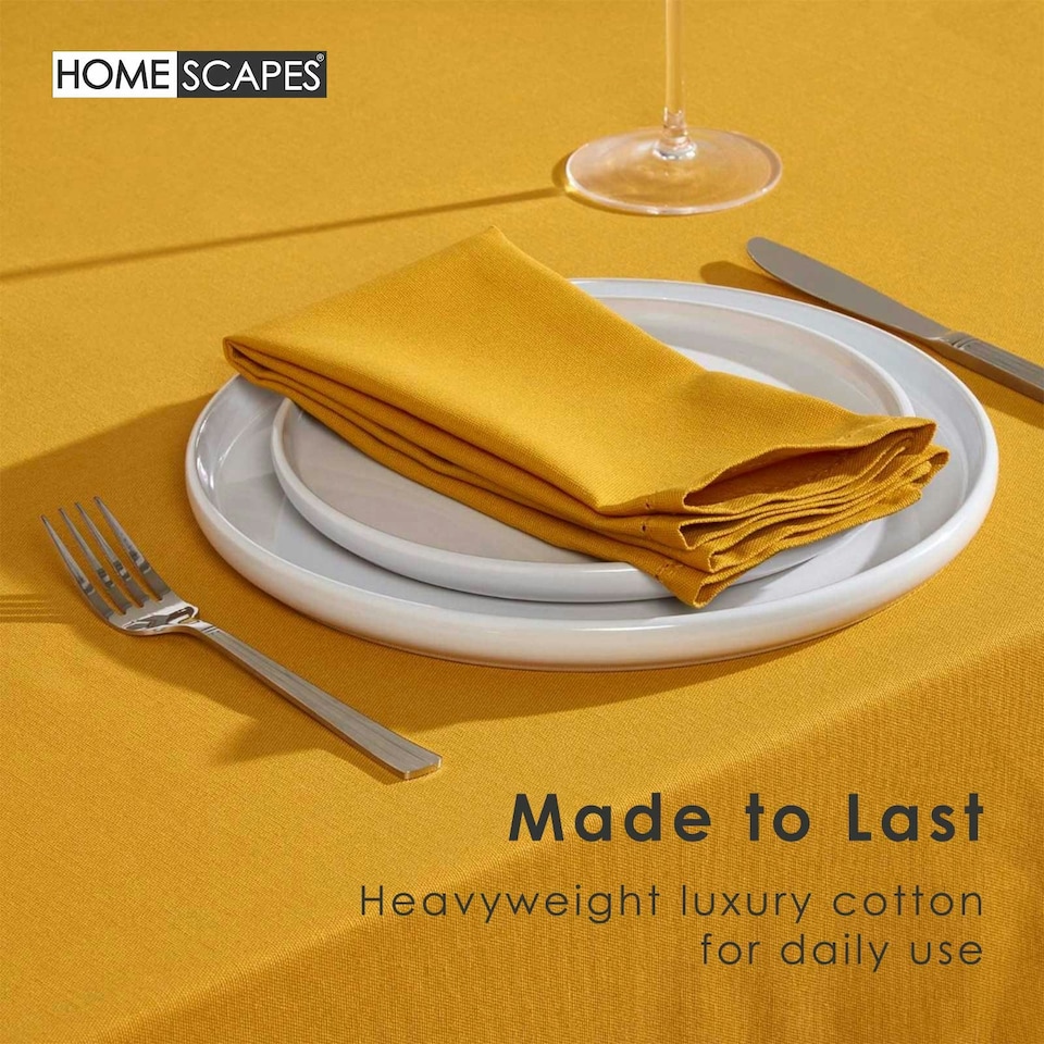 image 1 of Homescapes Mustard Yellow Cotton Round Tablecloth - 178 cm | Yellow | 178cm (70")