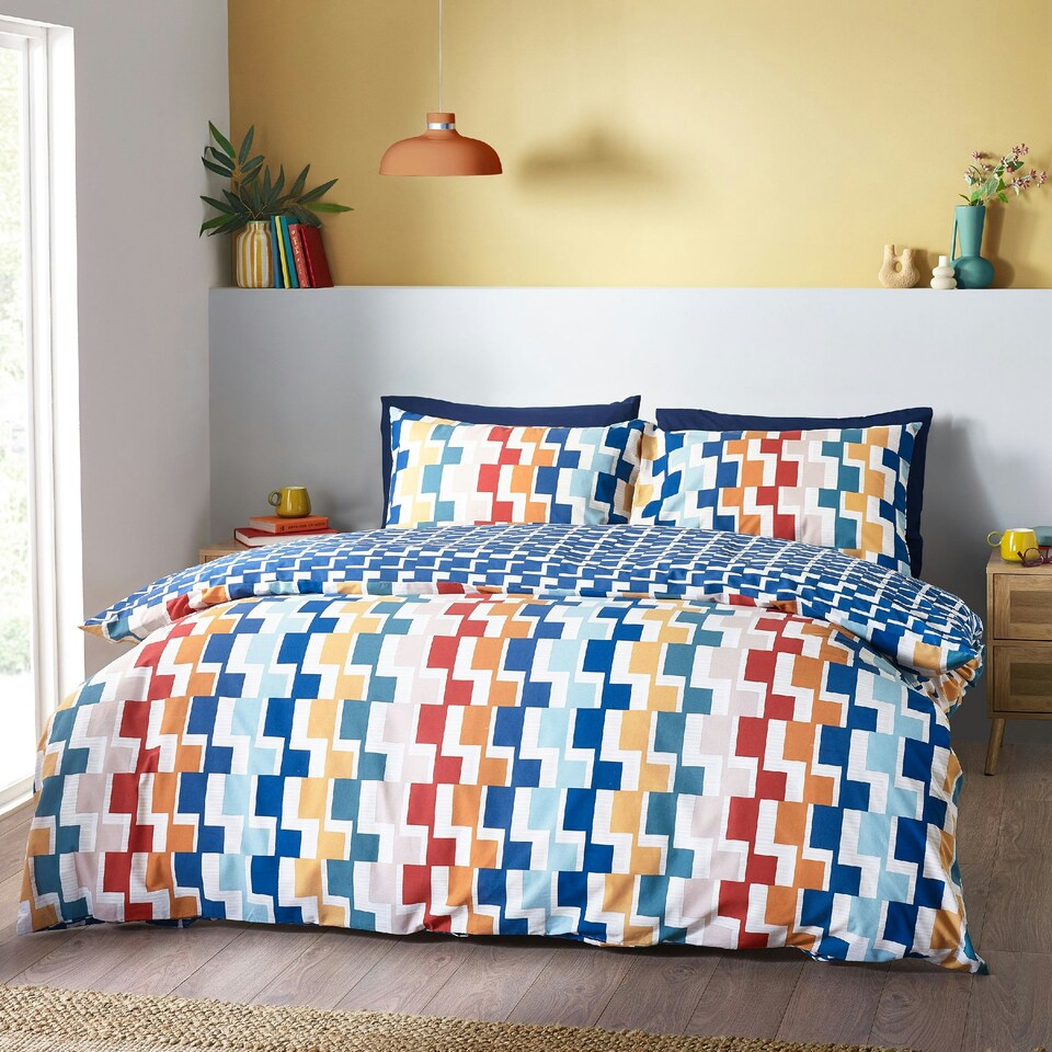 image 1 of Catherine Lansfield Bryson Geo Reversible Duvet Cover Set Brights Blue | Brights | Single