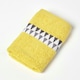 image 1 of Homescapes Geometric 100% Cotton Face Cloth - Ochre Yellow | Face cloth