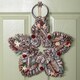 image 1 of 35cm Frosted Hanging Christmas Star Wreath with Red Jingle Bells & Wooden Stars