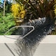 image 7 of 40m Black Gutter Brush Leaf & Moss Guard Protection with Set of 8 Downpipe Plugs