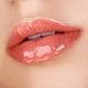 image 4 of Profusion Juicy Lip Tint Nourishing Oil Curious Coral
