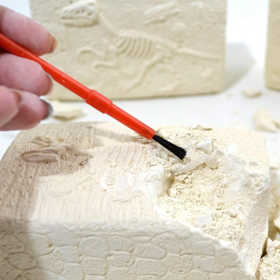 image 1 of The Magic Toy Shop Dinosaur Fossils Digging Excavation Kit Glow in the Dark Science Toy