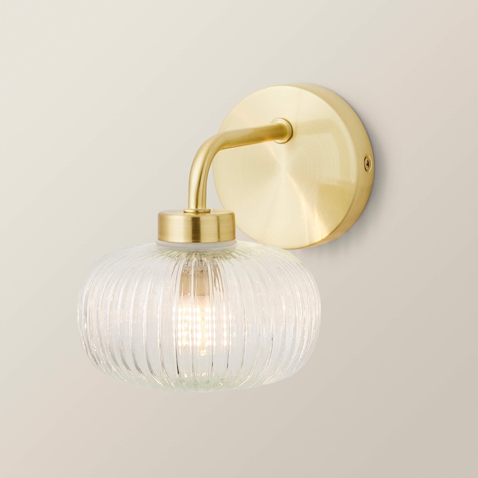 image 1 of ValueLights Amaia Gold IP44 Clear Ribbed Glass Wall Light & Bulbs | Gold