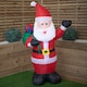 image 4 of 130cm (4ft) Inflatable LED Outdoor Christmas Standing Santa with Gift in Sack