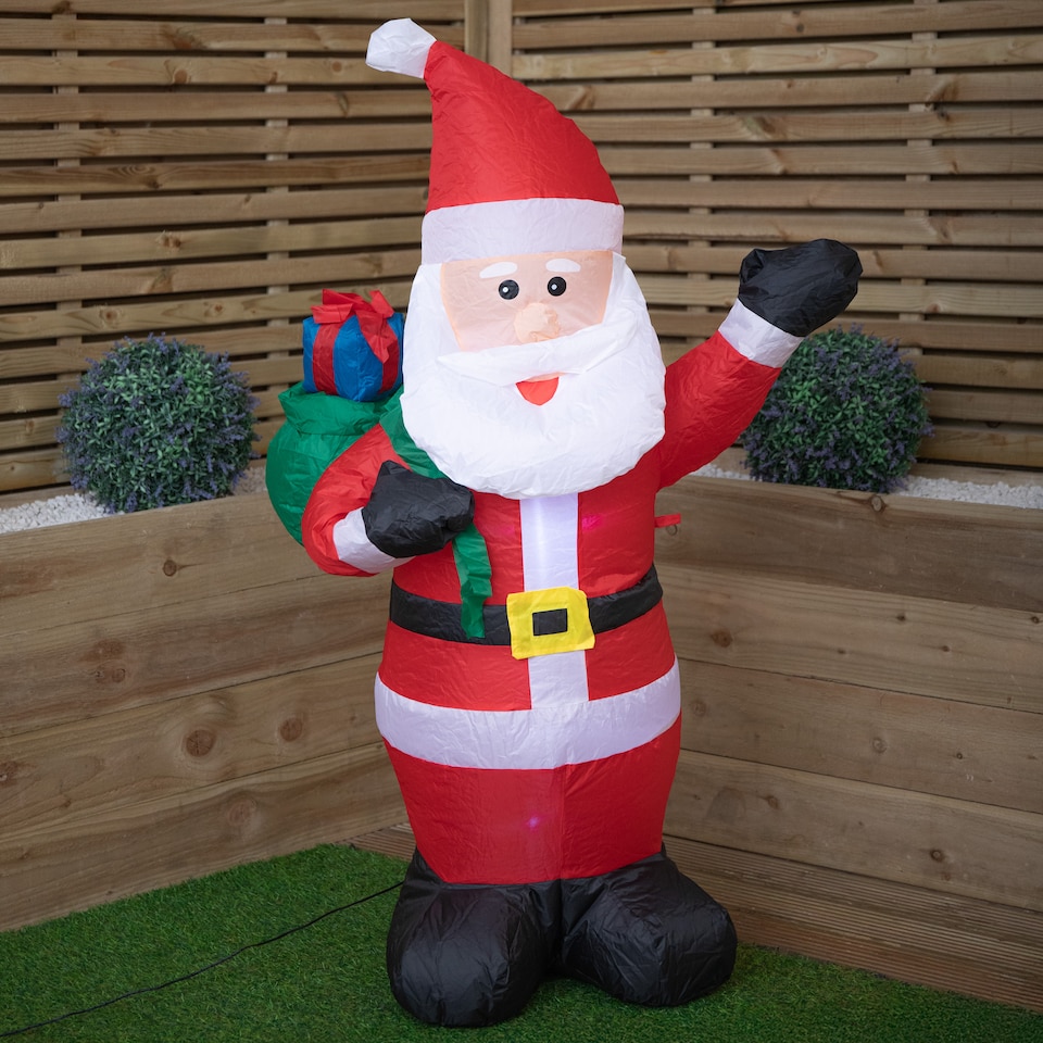image 1 of 130cm (4ft) Inflatable LED Outdoor Christmas Standing Santa with Gift in Sack