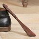 image 1 of Ornate Iron Shoe Horn Brown