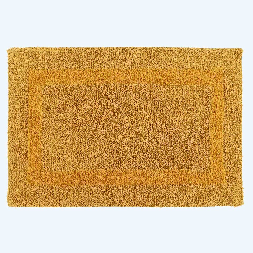 image 1 of Homescapes Luxury Reversible Cotton Bath Mat - Mustard Yellow Yellow